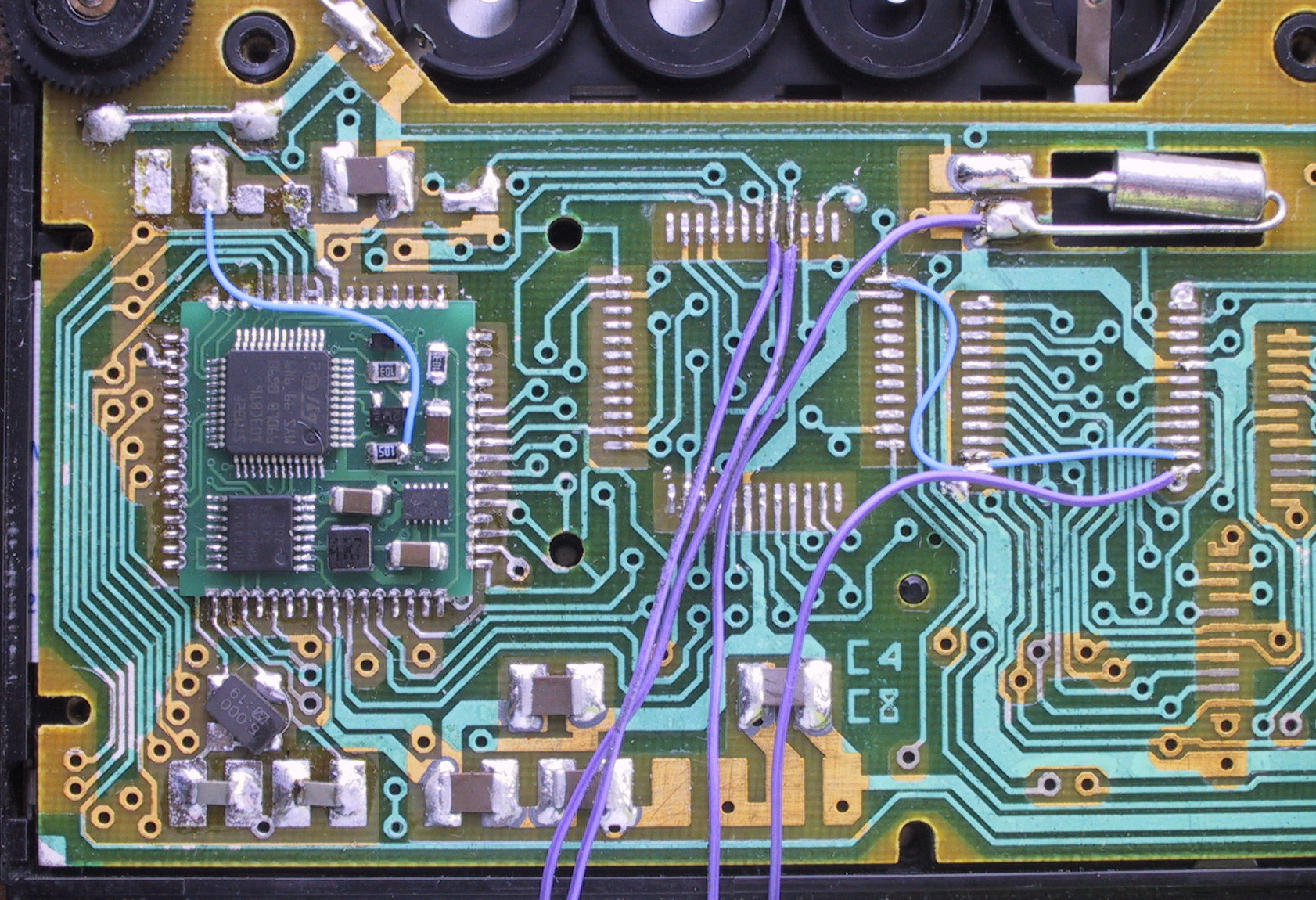 board with an STM32 microcontroller installed in the MK-85 calculator